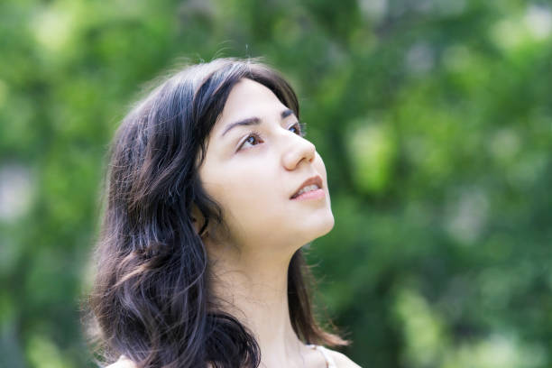 istock A young woman showing a relaxed expression 1254715793