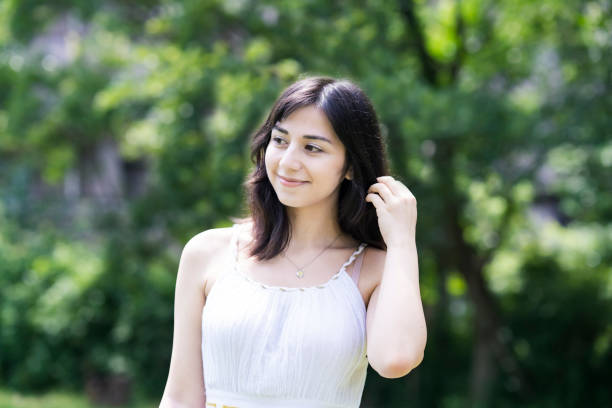 istock A young woman showing a relaxed expression 1254716308