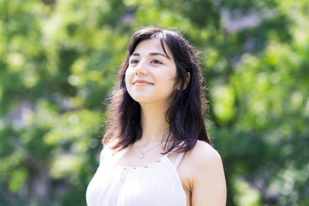 istock A young woman showing a relaxed expression 1254716505