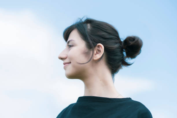 istock A young woman showing a relaxed expression 1254716729
