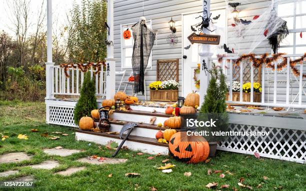 Halloween Jackolantern Pumpkins On A Porch Stairs Stock Photo - Download Image Now