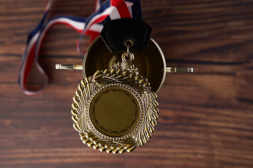 top view of award trophy on the wood background