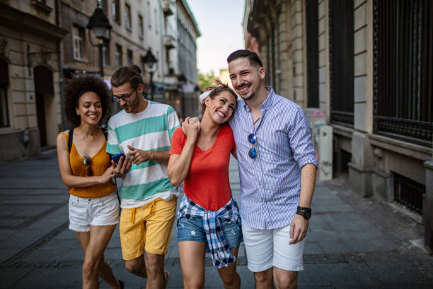 istock Friends enjoying city life 1254725450