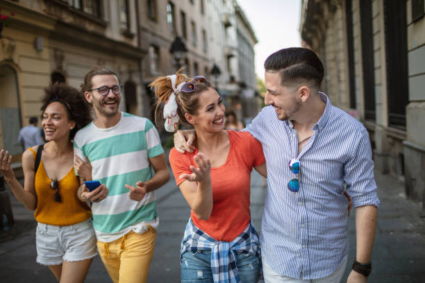 istock Friends enjoying city life 1254725480