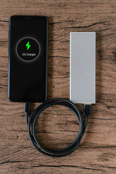 istock Phone connect to power bank on top view 1254726863