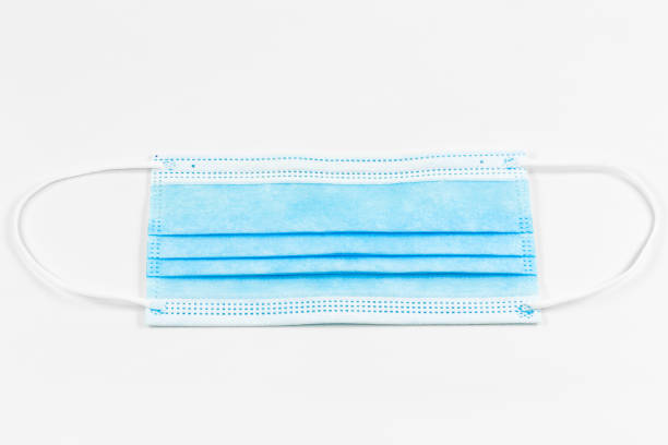 istock a single surgical masks isolated on white background 1254728845