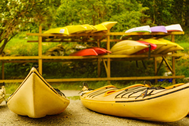 istock Kayaks on water shore. Rental area 1254745921
