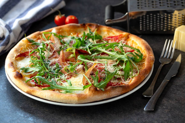 istock Green pizza topping with healthy plants 1254748908