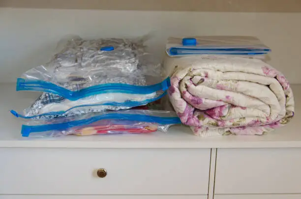 Vacuum sealing (clothes, duvets, blankets, sheets) to save space.