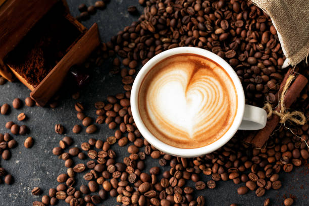 istock Pour latte art decorating a cup of espresso 1254749774