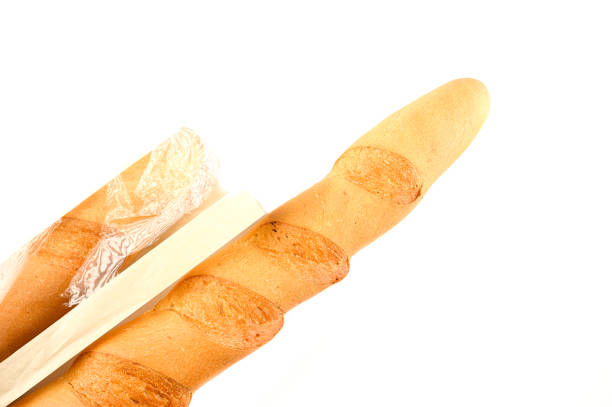 istock baguette in craft package on an isolated background 1254752146