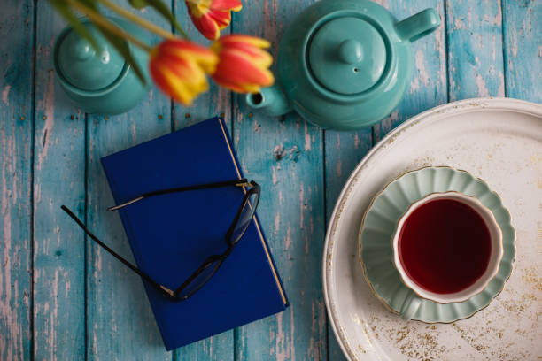 Closed book and a tea cup for a relaxing moment