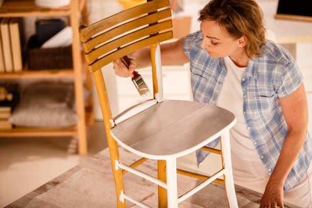istock Focused woman staying at home during weekend for a little DIY 1254754891