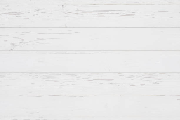 istock Weathered white wooden background texture. Top view surface of the table. 1254756410