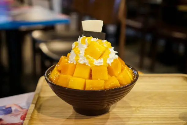 Photo of Mango Cheese Bingsu/Bingsoo. A famous Korean dessert.