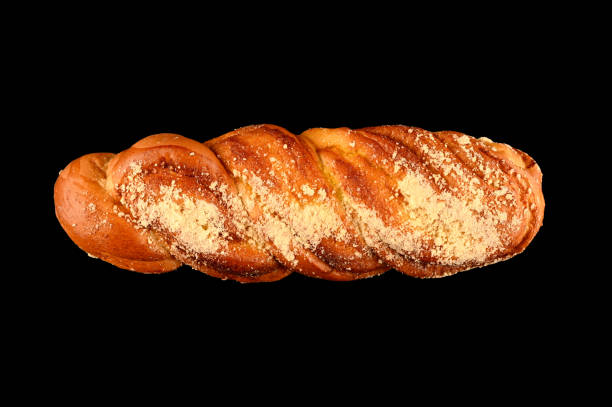 istock baguette with powdered sugar on a black background 1254758114