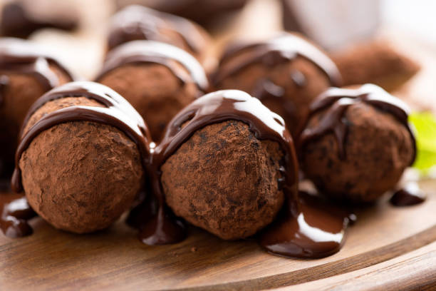 istock Chocolate truffles with chocolate ganache glaze 1254761413