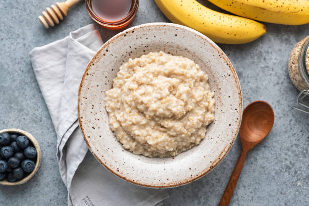 istock Oatmeal porridge in a bowl 1254761417