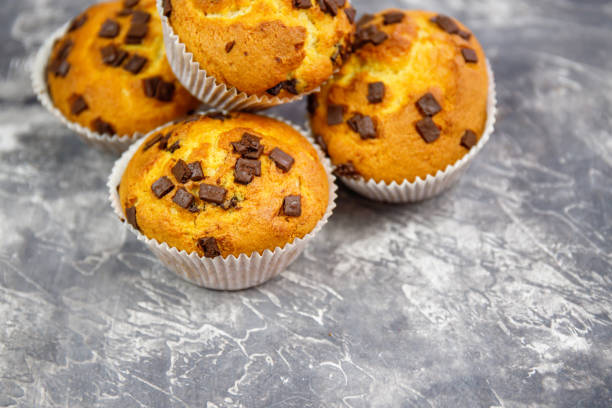 istock Homemade Chocolate Chip Muffins  on rustic background 1254762569