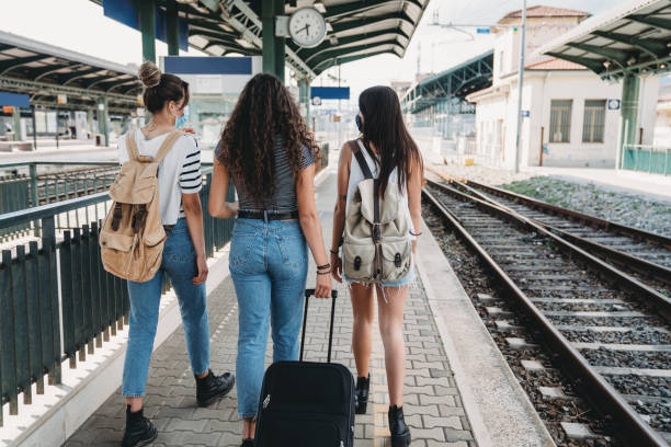 istock Three friends enjoying a trip together - Rear view 1254765921