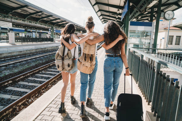 istock Three friends enjoying a trip together - Rear view 1254765932