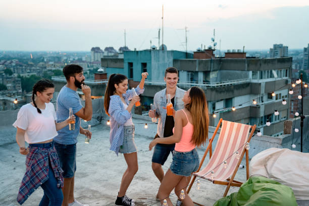 istock Group of young friends having fun togethert. 1254767440