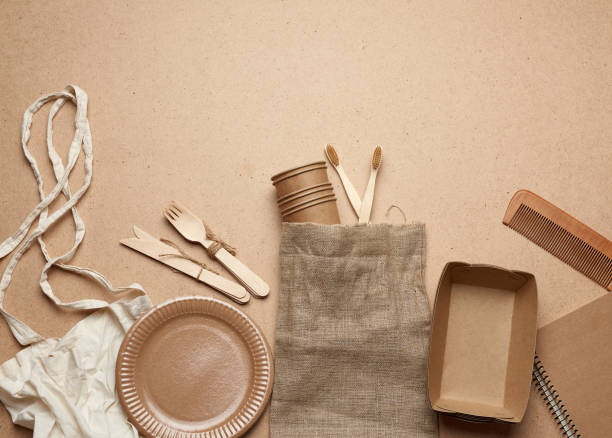 istock white textile bag and disposable tableware from brown craft paper 1254771829