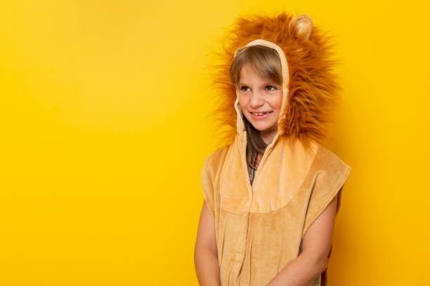 istock Child wearing lion costume 1254772466