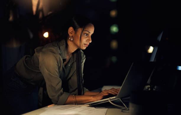 istock Keeping her mind on the deadline 1254775960