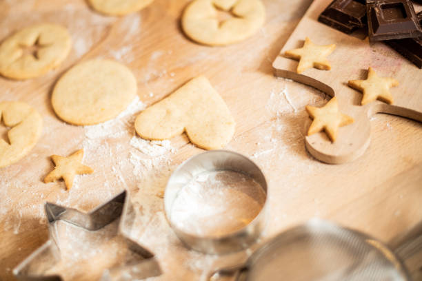 istock Woman baking at home: Cookies preparation ingredients 1254775976
