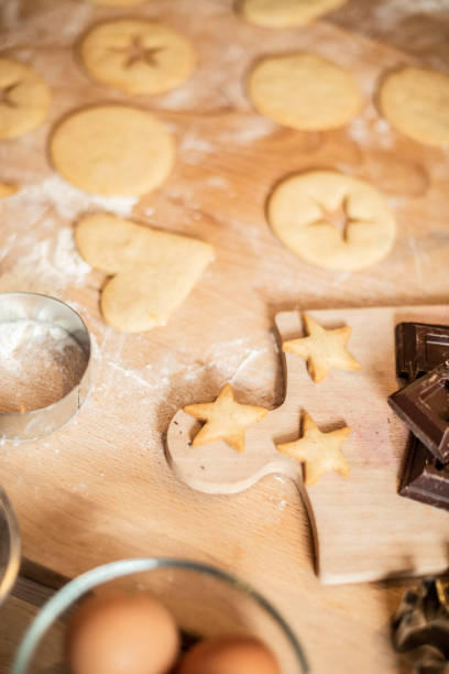 istock Woman baking at home: Cookies preparation ingredients 1254776729
