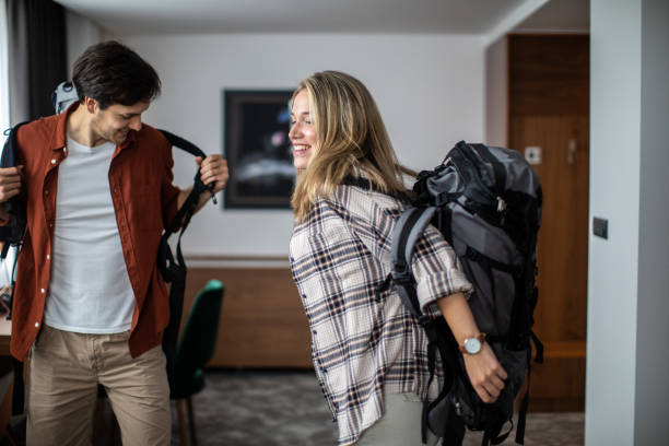 istock Young couple at hotel suite 1254776730