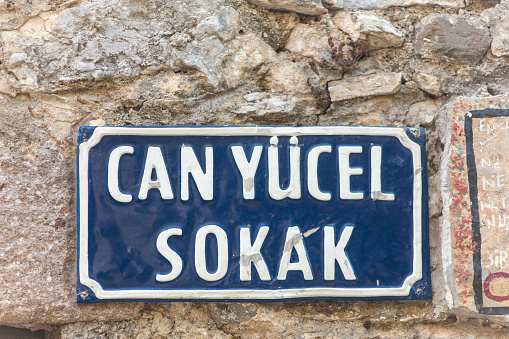 famous dead poet can yucel street sign plate  in datca  mugla turkey