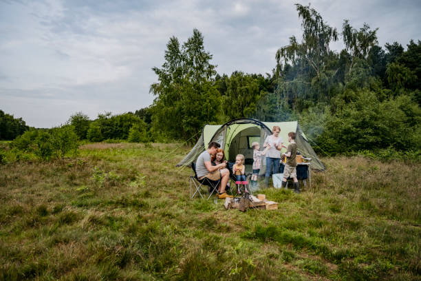 istock Family enjoying springtime wild camping 1254778099