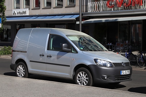 Volkswagen Caddy compact van car parked in Germany. There were 45.8 million cars registered in Germany (as of 2017).