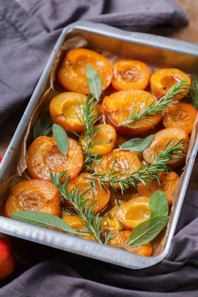 istock Baked apricots with honey, sage and rosemary leaves 1254781521