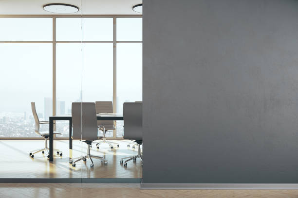 istock Conference office room with and blank wall. 1254789591