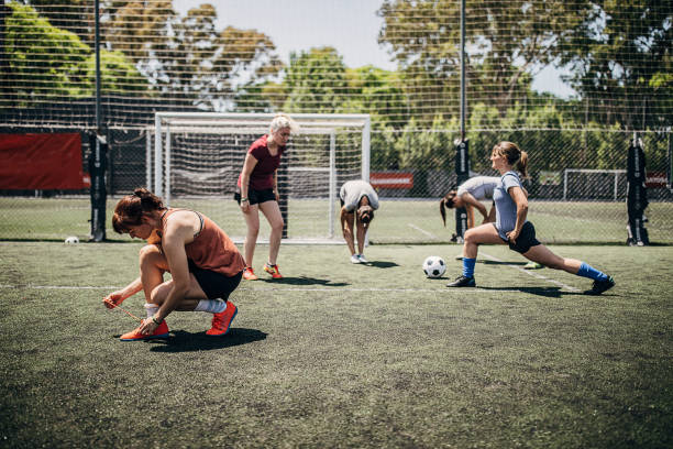 istock Female soccer players preparing for match 1254790994