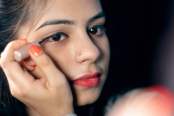 istock Eye Make-up with black eyeliner close-up portrait 1254796037