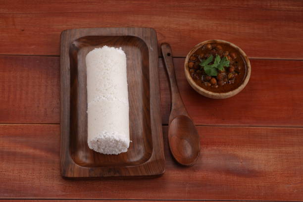Raw rice Puttu with Bengal  gram curry stock photo