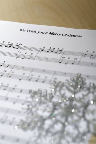 istock Christmas ornament on sheet music 1254797930