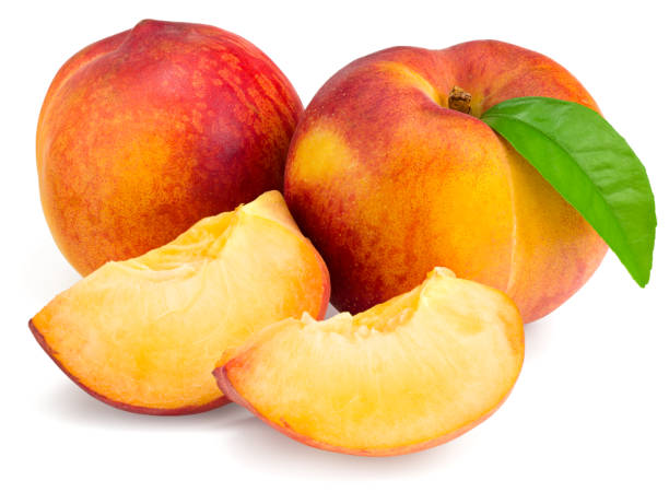 istock peach fruit with green leaf and slice isolated on white background 1254799348