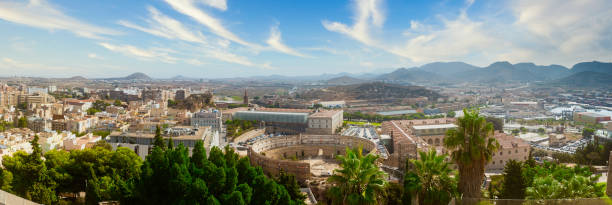 Panorama of the city of Cartegena. A Town located in the Region of Murcia, by the Mediterranean coast, south-eastern Spain showing the Roman Theatre of Carthago Nova Panorama of the city of Cartegena. A Town located in the Region of Murcia, by the Mediterranean coast, south-eastern Spain showing the Roman Theatre of Carthago Nova murcia stock pictures, royalty-free photos & images
