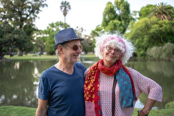 istock Humorous wife making a face while with her husband outdoors 1254805225