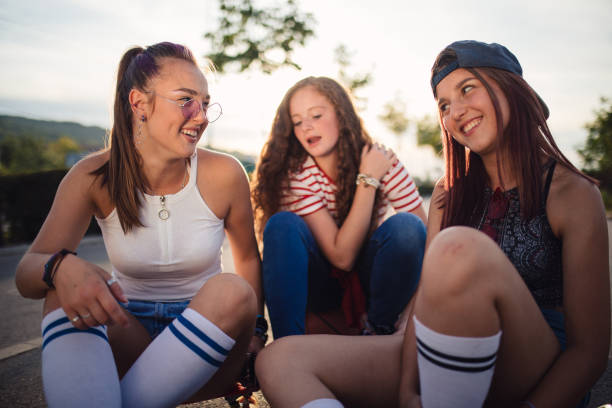 istock Two girls looking at eachother 1254806905