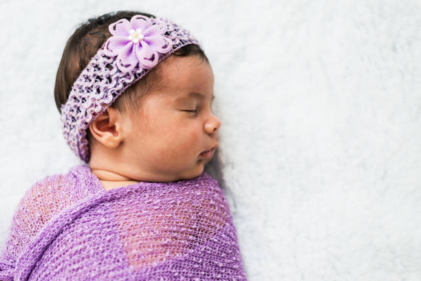 istock Sleeping newborn baby girl 1254808246