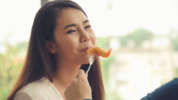 istock Happy romantic couple eating lunch at restaurant 1254809091