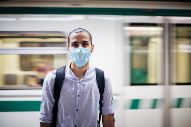 istock Portrait Of Young Man With Protective Face Mask. 1254810567