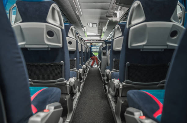 istock Shuttle Bus Driver Awaiting Passengers Inside the Vehicle During Virus Outbreak 1254810626