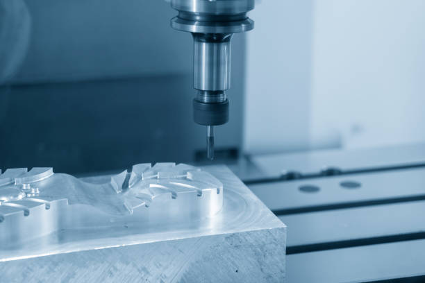 istock The CNC milling machine cutting the shoe mold parts with solid ball end mill tool. 1254810744